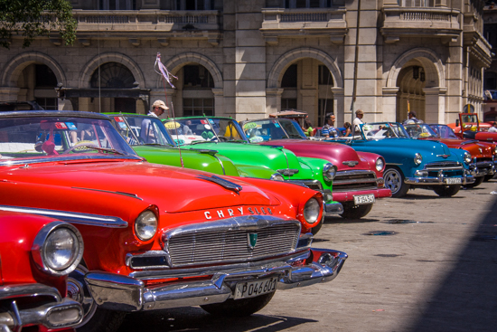 These GORGEOUS totally restored cars will be glad to give you a 1 hour tour - these were parked across from the Capitolio, but they are everywhere there are tourists. 