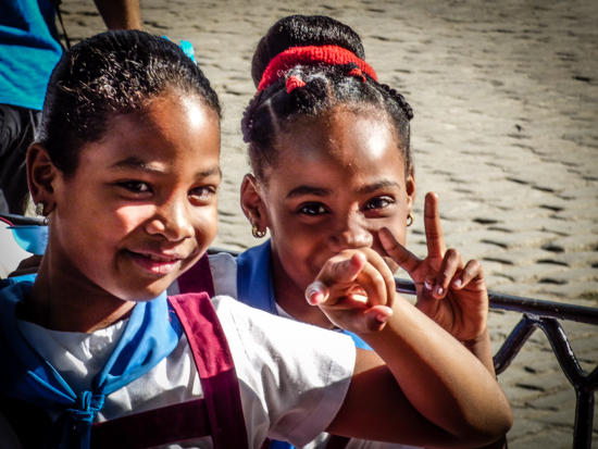 Happy school children on a field trip to Plaza de Armas.