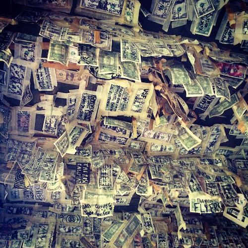 Cabbage Key collection of dollar bills above our table.